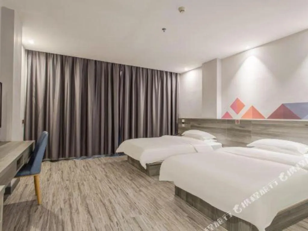 Bed in Borrman Hotel Fangchenggang Qisha