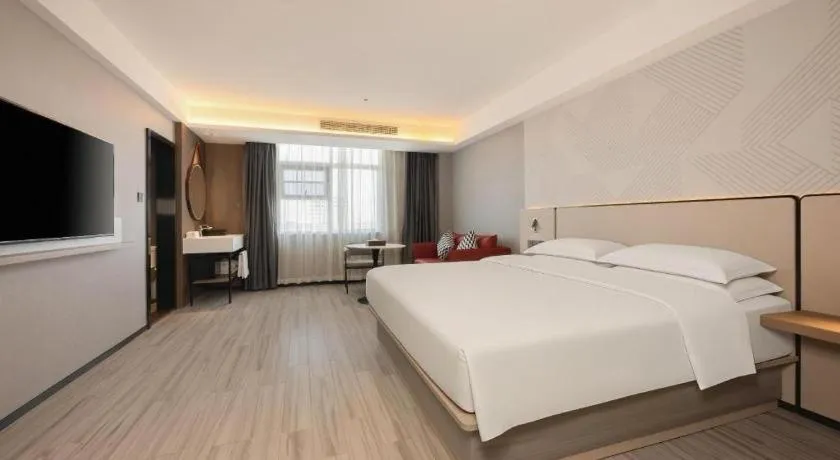 Bed in Borrman Hotel Fangchenggang Qisha