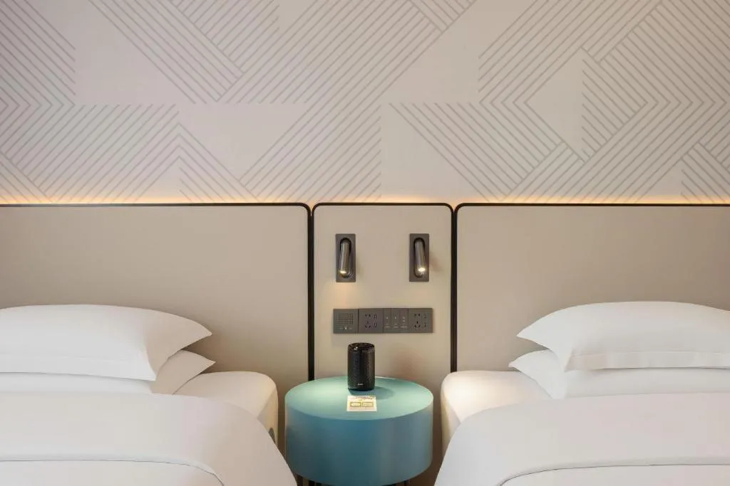 Bed in Borrman Hotel Fangchenggang Qisha