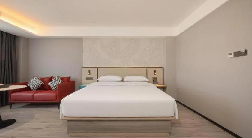 Bed in Borrman Hotel Fangchenggang Qisha