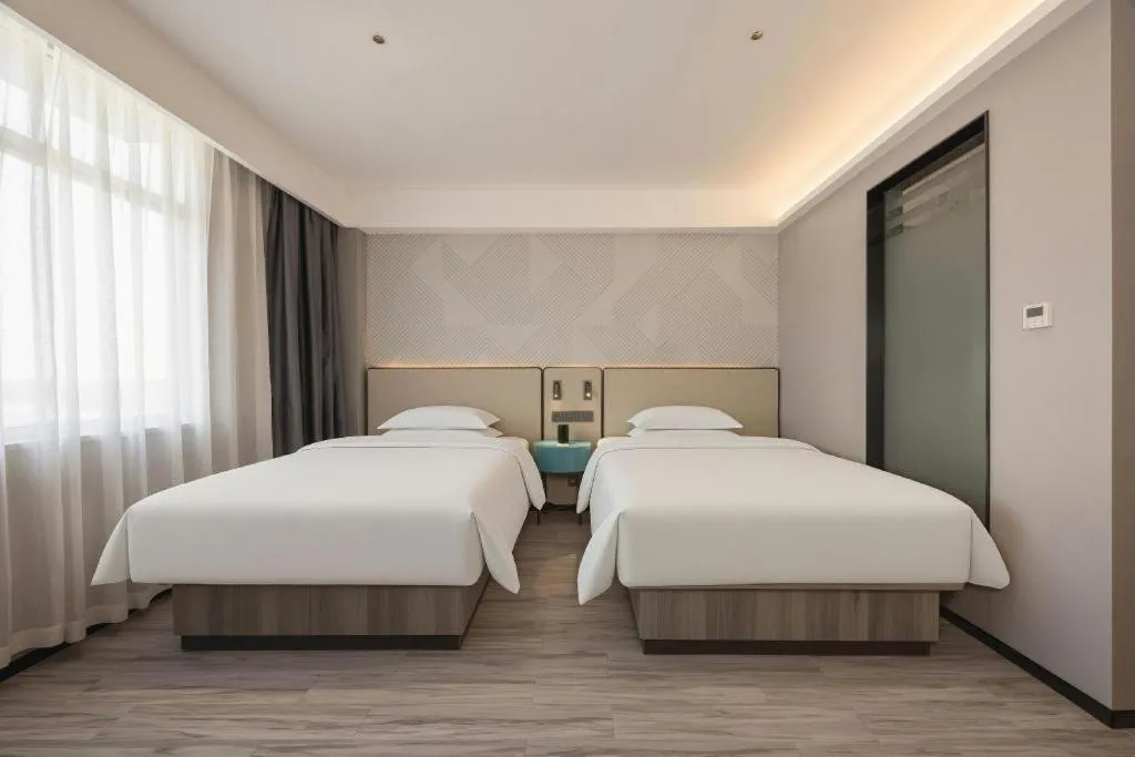 Bed in Borrman Hotel Fangchenggang Qisha