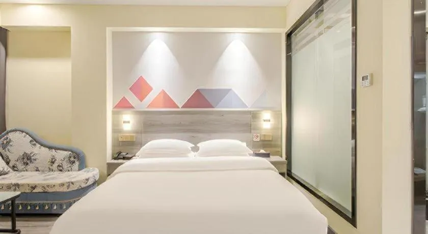 Bed in Borrman Hotel Fangchenggang Qisha