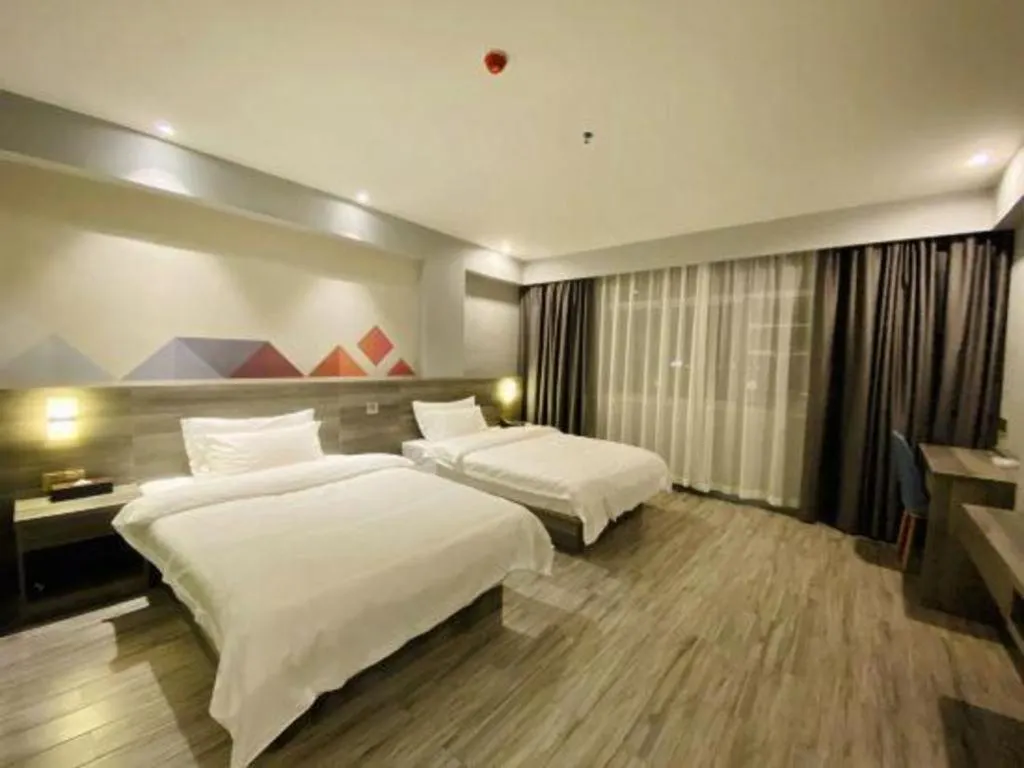 Bed in Borrman Hotel Fangchenggang Qisha