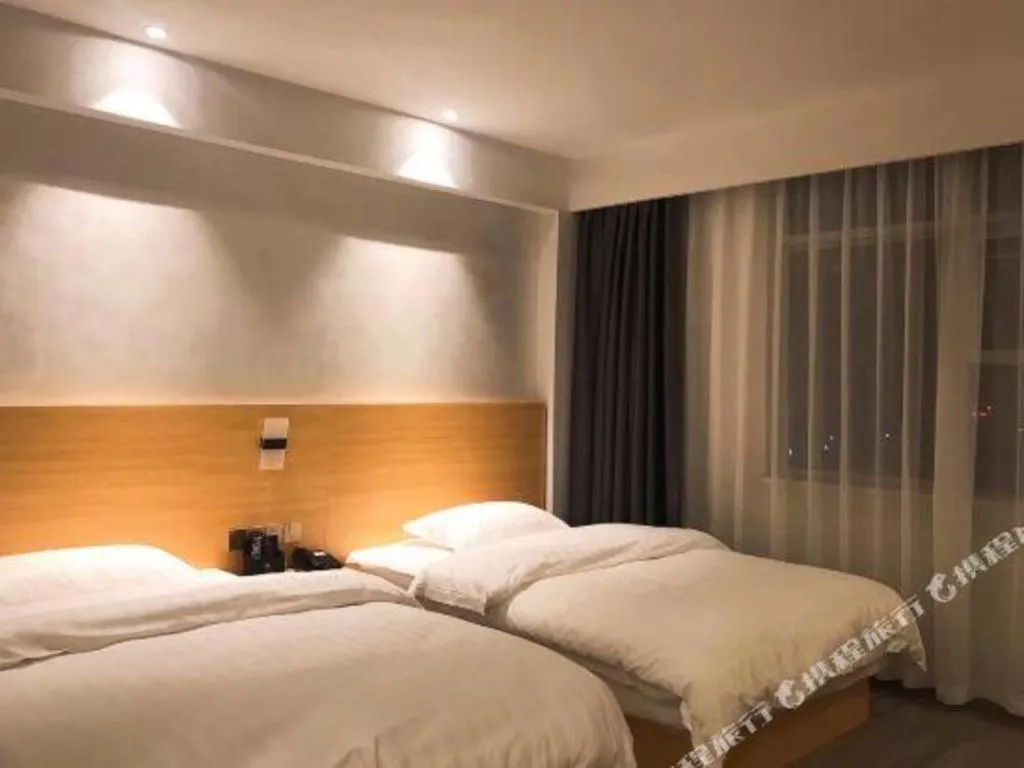 Bed in Borrman Hotel Fangchenggang Qisha