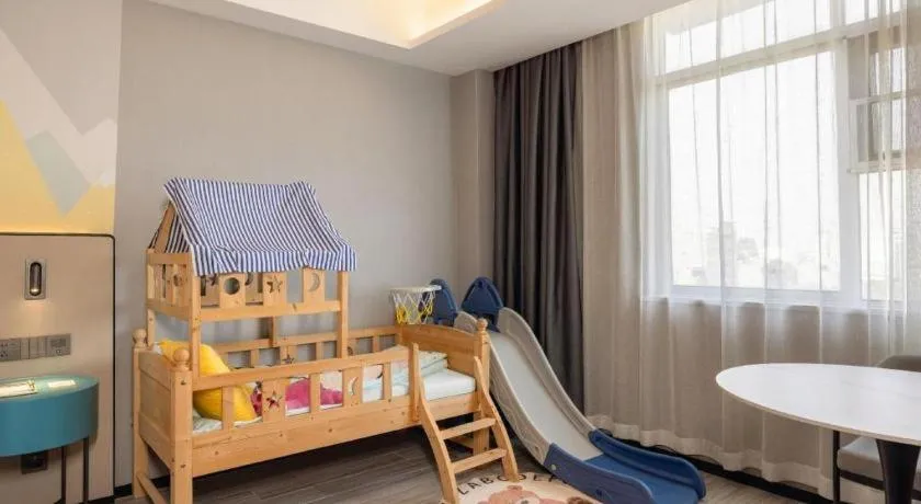 Bed in Borrman Hotel Fangchenggang Qisha