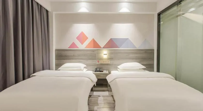 Bed in Borrman Hotel Fangchenggang Qisha