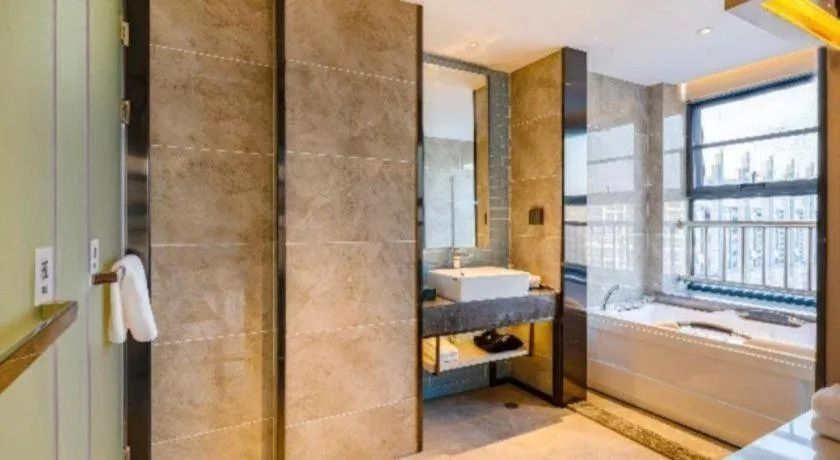 Bed in Echarm Hotel Suzhou Shengze Oriental Extile City