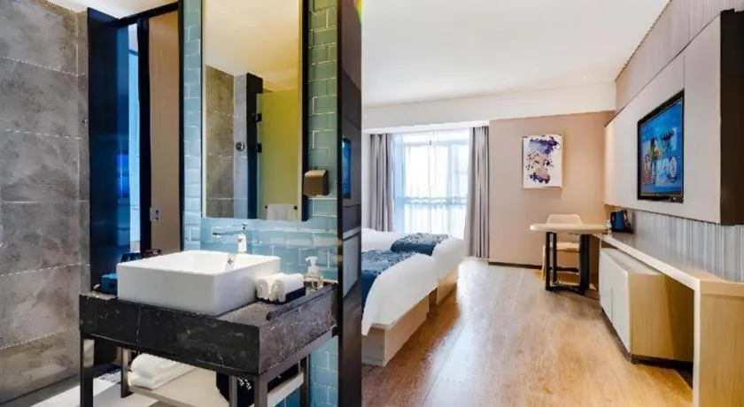 Bed in Echarm Hotel Suzhou Shengze Oriental Extile City