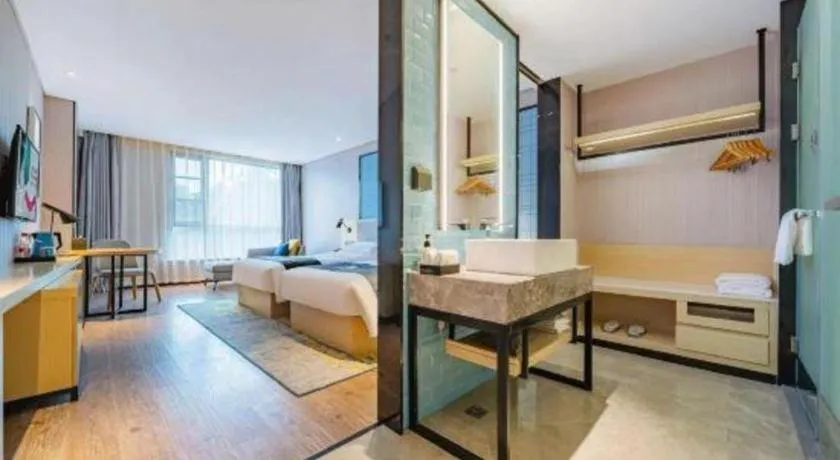 Bed in Echarm Hotel Suzhou Shengze Oriental Extile City