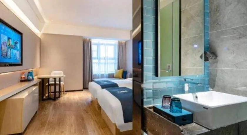 Bed in Echarm Hotel Suzhou Shengze Oriental Extile City