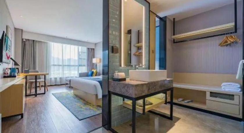 Bed in Echarm Hotel Suzhou Shengze Oriental Extile City