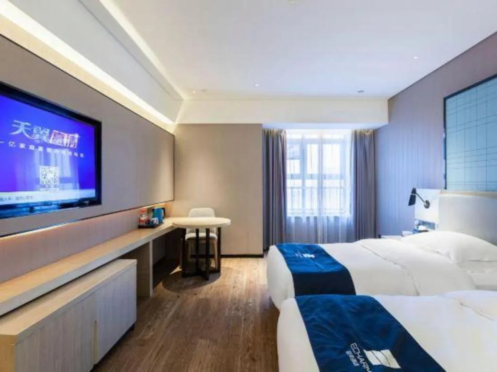 Bed in Echarm Hotel Suzhou Shengze Oriental Extile City