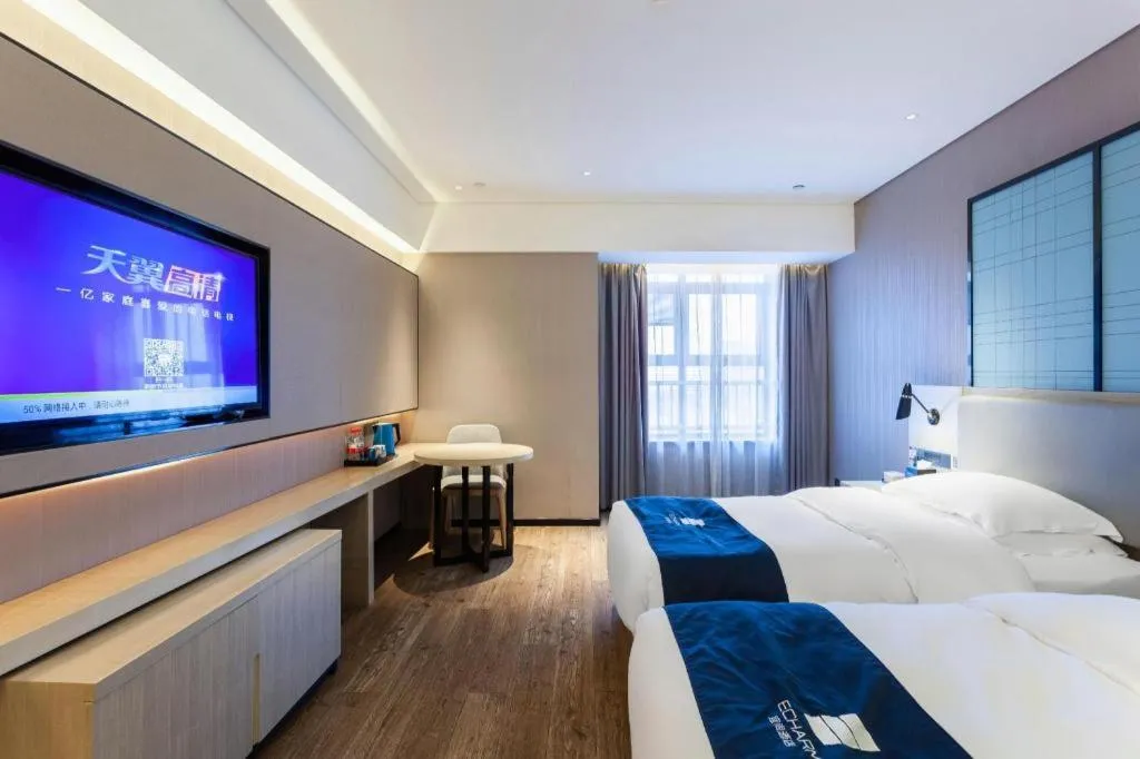 Bed in Echarm Hotel Suzhou Shengze Oriental Extile City