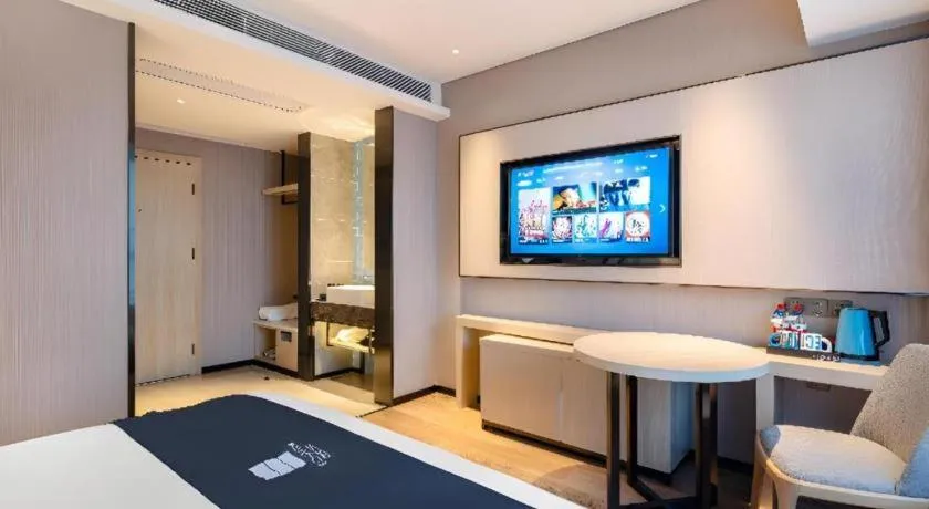 Bed in Echarm Hotel Suzhou Shengze Oriental Extile City