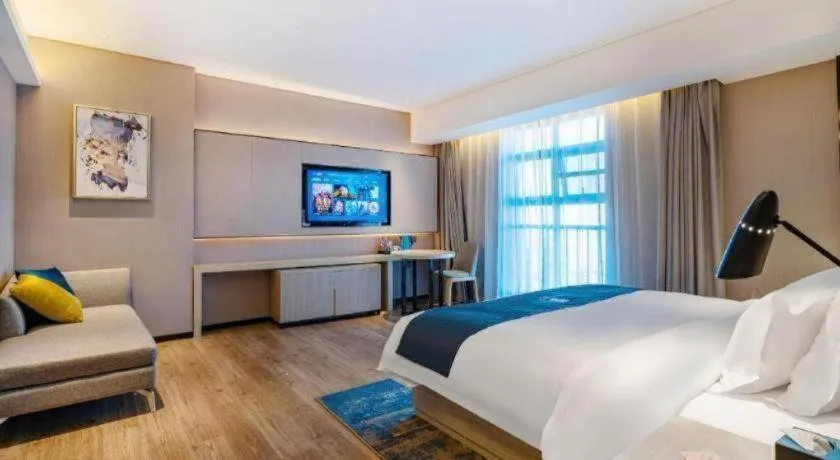 Bed in Echarm Hotel Suzhou Shengze Oriental Extile City
