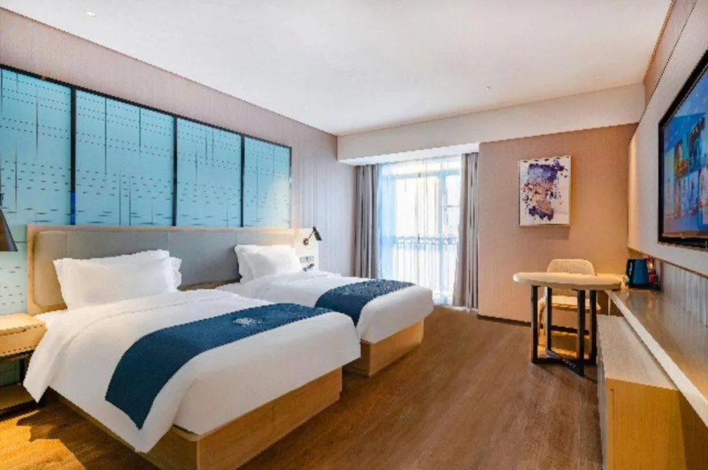 Bed in Echarm Hotel Suzhou Shengze Oriental Extile City