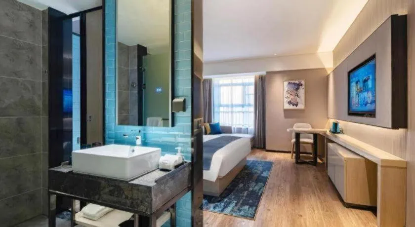 Bed in Echarm Hotel Suzhou Shengze Oriental Extile City