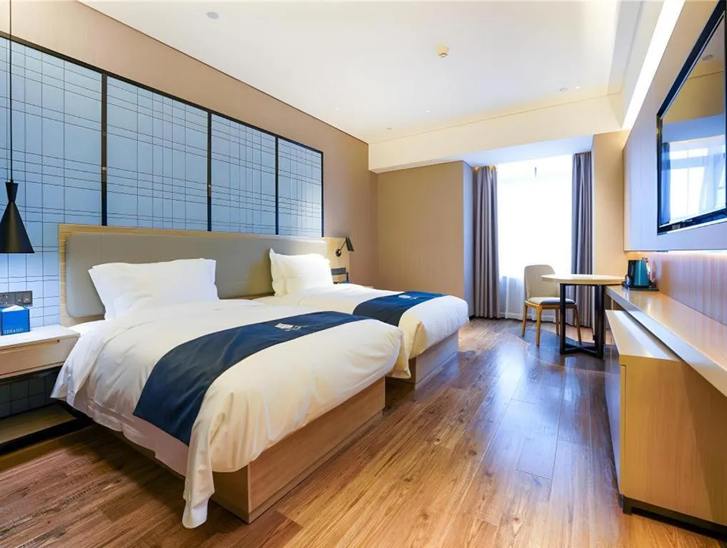 Bed in Echarm Hotel Suzhou Shengze Oriental Extile City