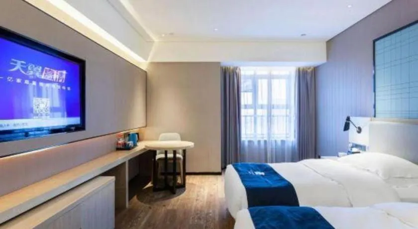 Bed in Echarm Hotel Suzhou Shengze Oriental Extile City
