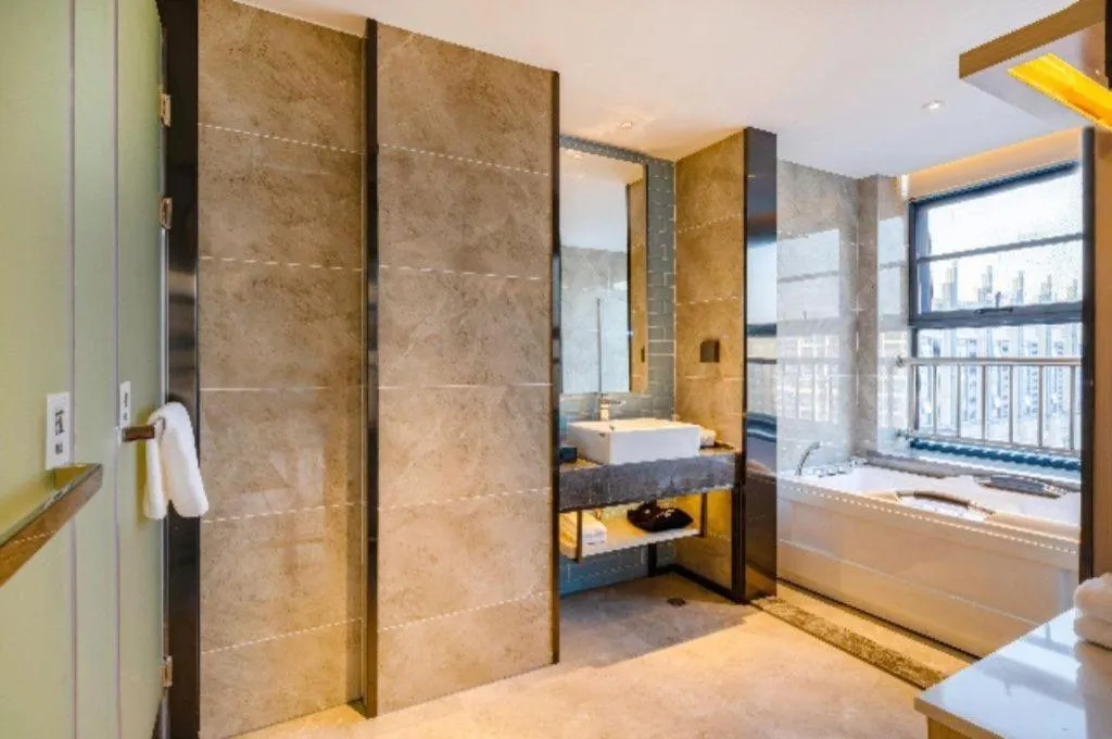 Bed in Echarm Hotel Suzhou Shengze Oriental Extile City