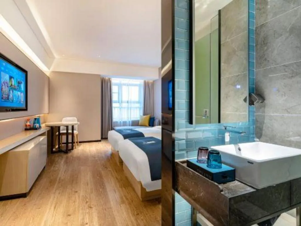 Bed in Echarm Hotel Suzhou Shengze Oriental Extile City