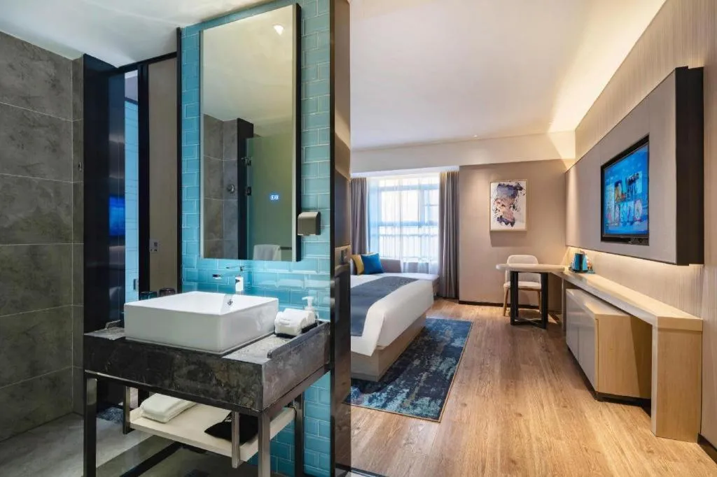 Bed in Echarm Hotel Suzhou Shengze Oriental Extile City