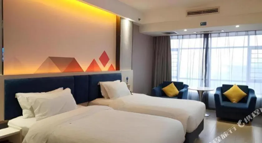 Bed in Borrman Hotel Liuzhou High-Speed Railway Station