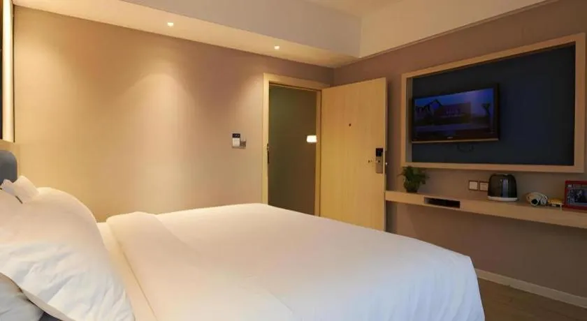 Bed in Borrman Hotel Liuzhou High-Speed Railway Station