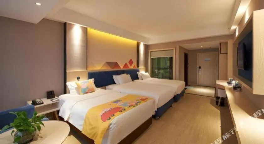 Bed in Borrman Hotel Liuzhou High-Speed Railway Station