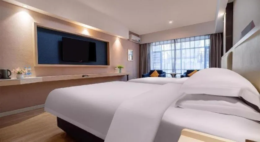 Bed in Borrman Hotel Liuzhou High-Speed Railway Station