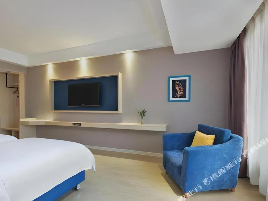 Bed in Borrman Hotel Liuzhou High-Speed Railway Station