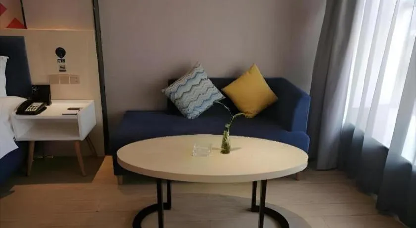 Bed in Borrman Hotel Liuzhou High-Speed Railway Station