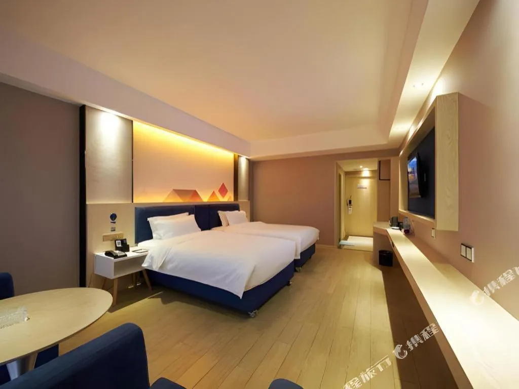 Bed in Borrman Hotel Liuzhou High-Speed Railway Station