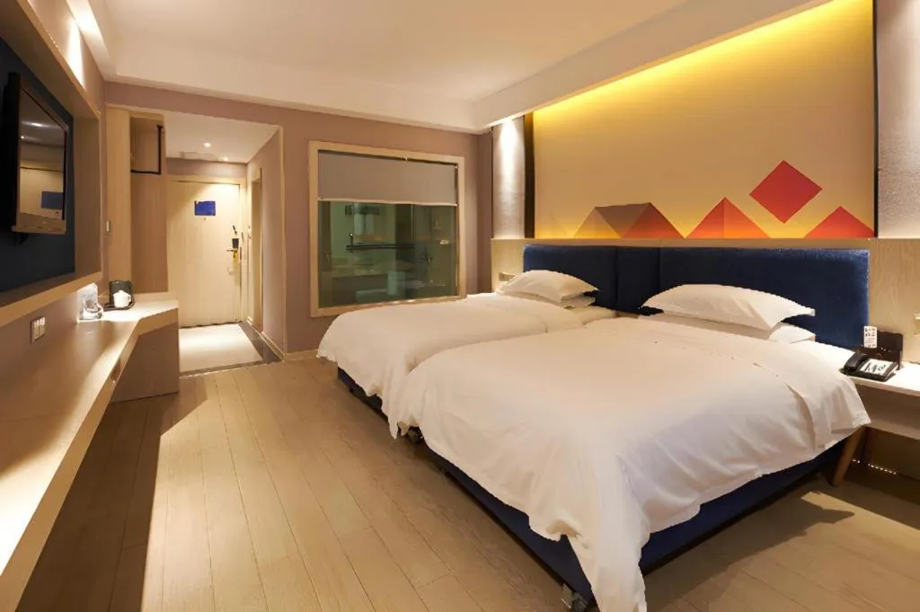 Bed in Borrman Hotel Liuzhou High-Speed Railway Station