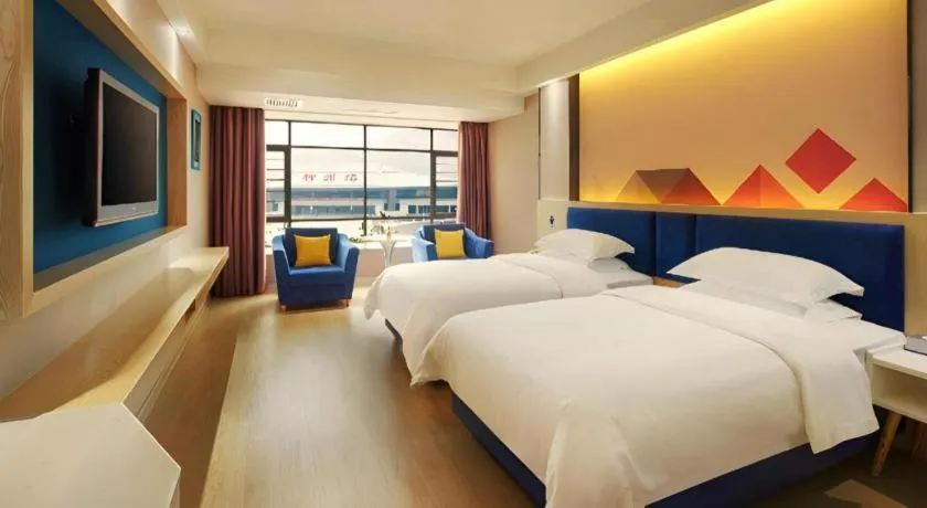 Bed in Borrman Hotel Liuzhou High-Speed Railway Station