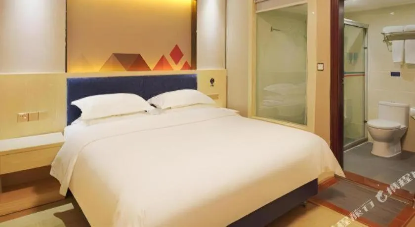 Bed in Borrman Hotel Liuzhou High-Speed Railway Station