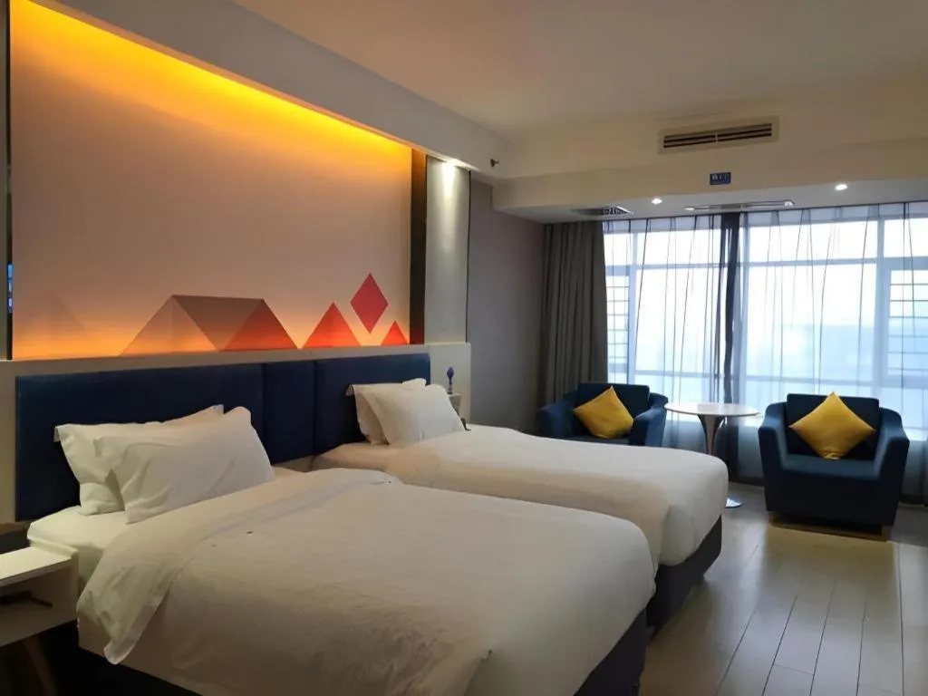 Bed in Borrman Hotel Liuzhou High-Speed Railway Station