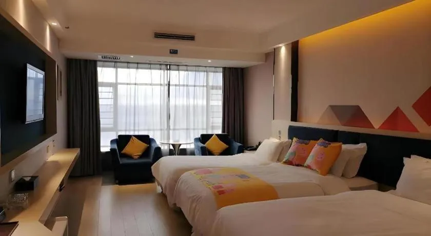 Bed in Borrman Hotel Liuzhou High-Speed Railway Station