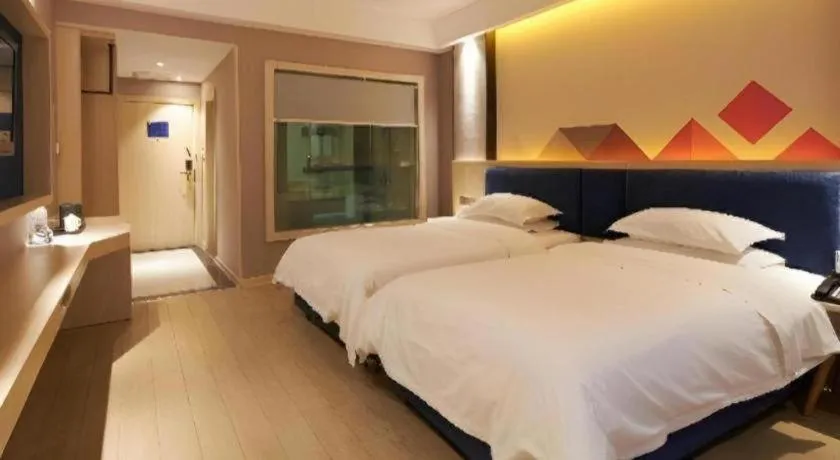 Bed in Borrman Hotel Liuzhou High-Speed Railway Station