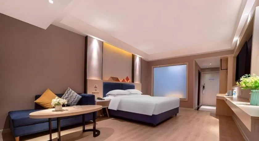 Bed in Borrman Hotel Liuzhou High-Speed Railway Station