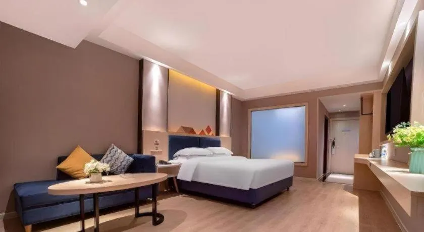 Bed in Borrman Hotel Liuzhou High-Speed Railway Station