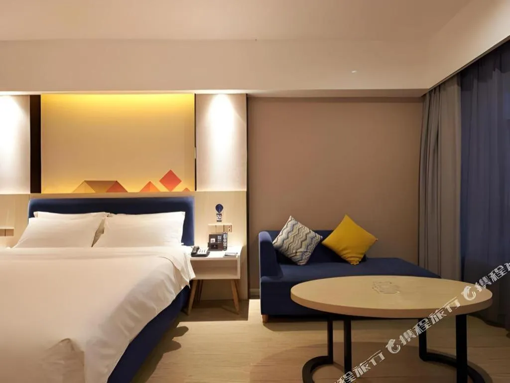 Bed in Borrman Hotel Liuzhou High-Speed Railway Station