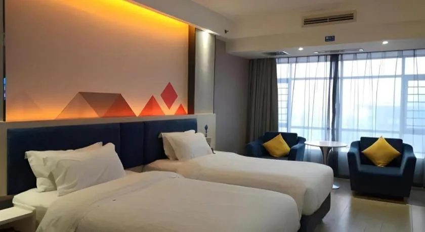 Bed in Borrman Hotel Liuzhou High-Speed Railway Station