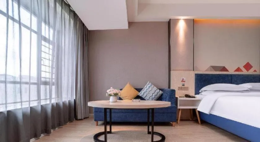 Bed in Borrman Hotel Liuzhou High-Speed Railway Station