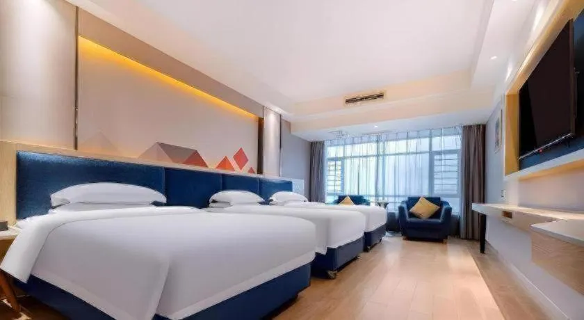 Bed in Borrman Hotel Liuzhou High-Speed Railway Station