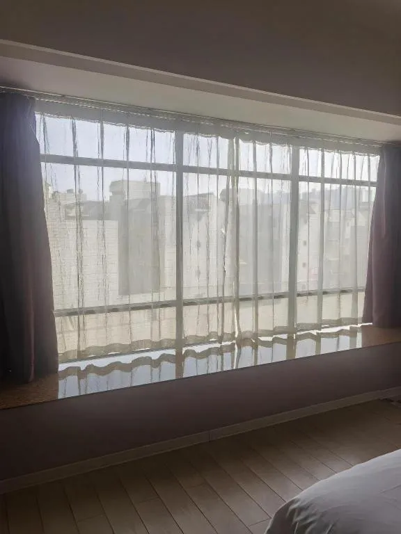 Bed in Borrman Hotel Liuzhou High-Speed Railway Station