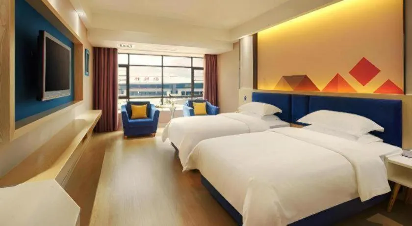 Bed in Borrman Hotel Liuzhou High-Speed Railway Station