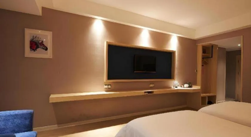 Bed in Borrman Hotel Liuzhou High-Speed Railway Station