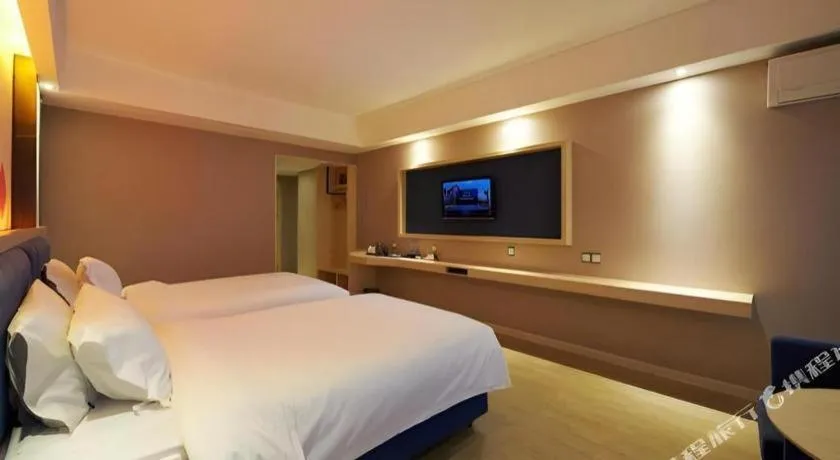 Bed in Borrman Hotel Liuzhou High-Speed Railway Station