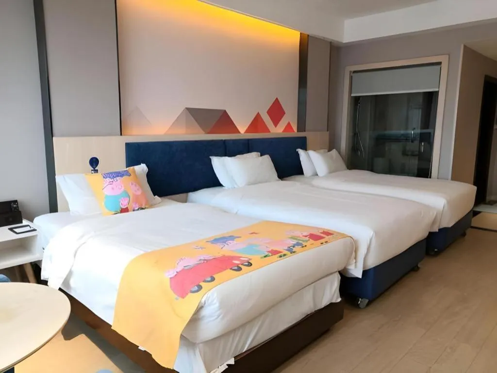 Bed in Borrman Hotel Liuzhou High-Speed Railway Station
